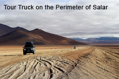 Tour Trucks on the perimeter of Salar de Uyuni Salt Flats